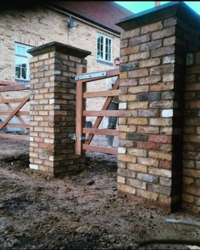 Rustic brick pillars and fencing constructed at a residential property in Fair Oak, Eastleigh, Hampshire